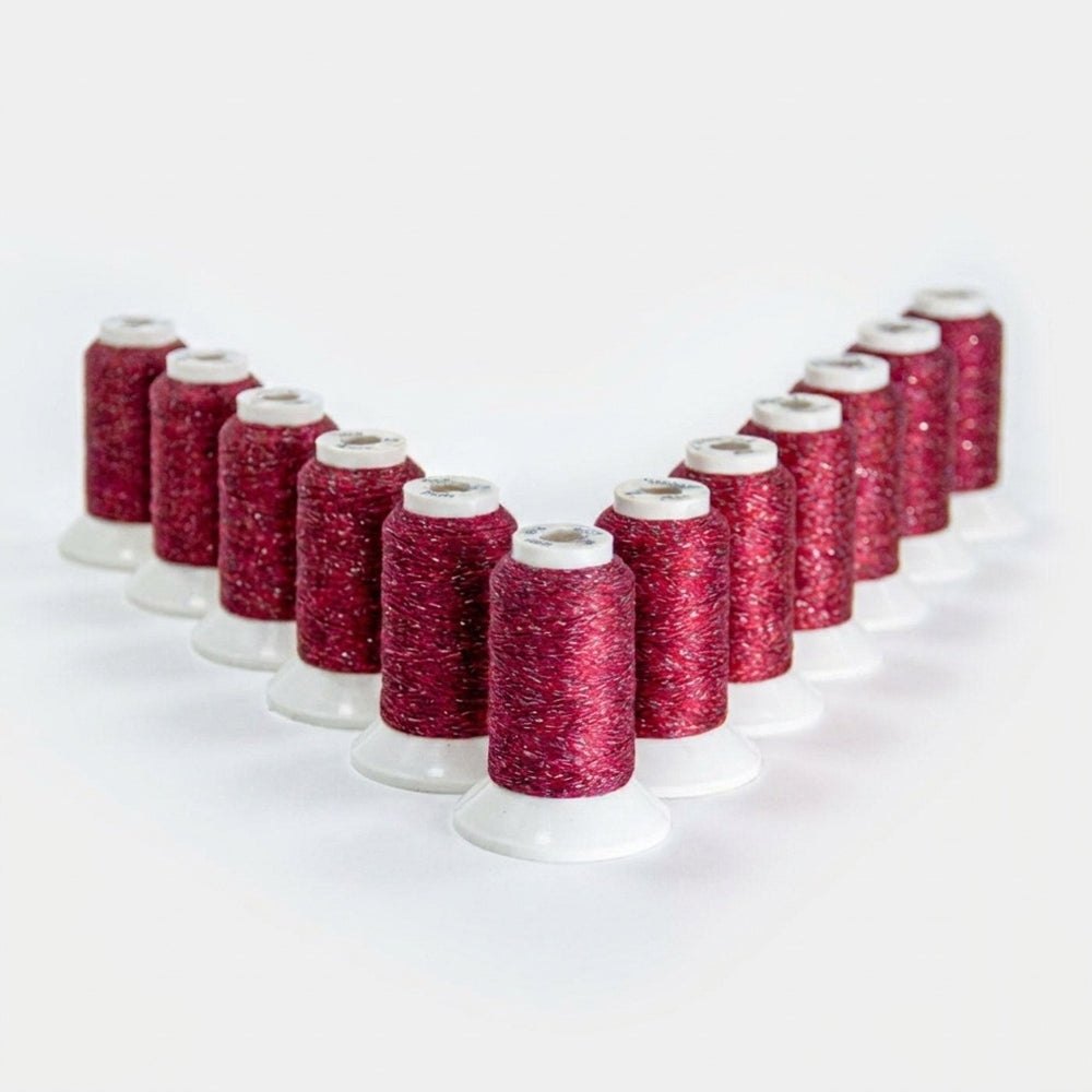 Reflective embroidery thread spools in assorted colors